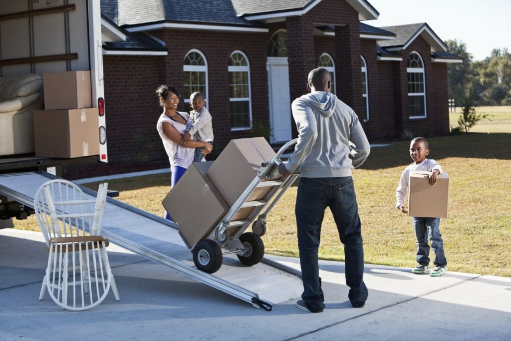 family moving in to their new home purchase